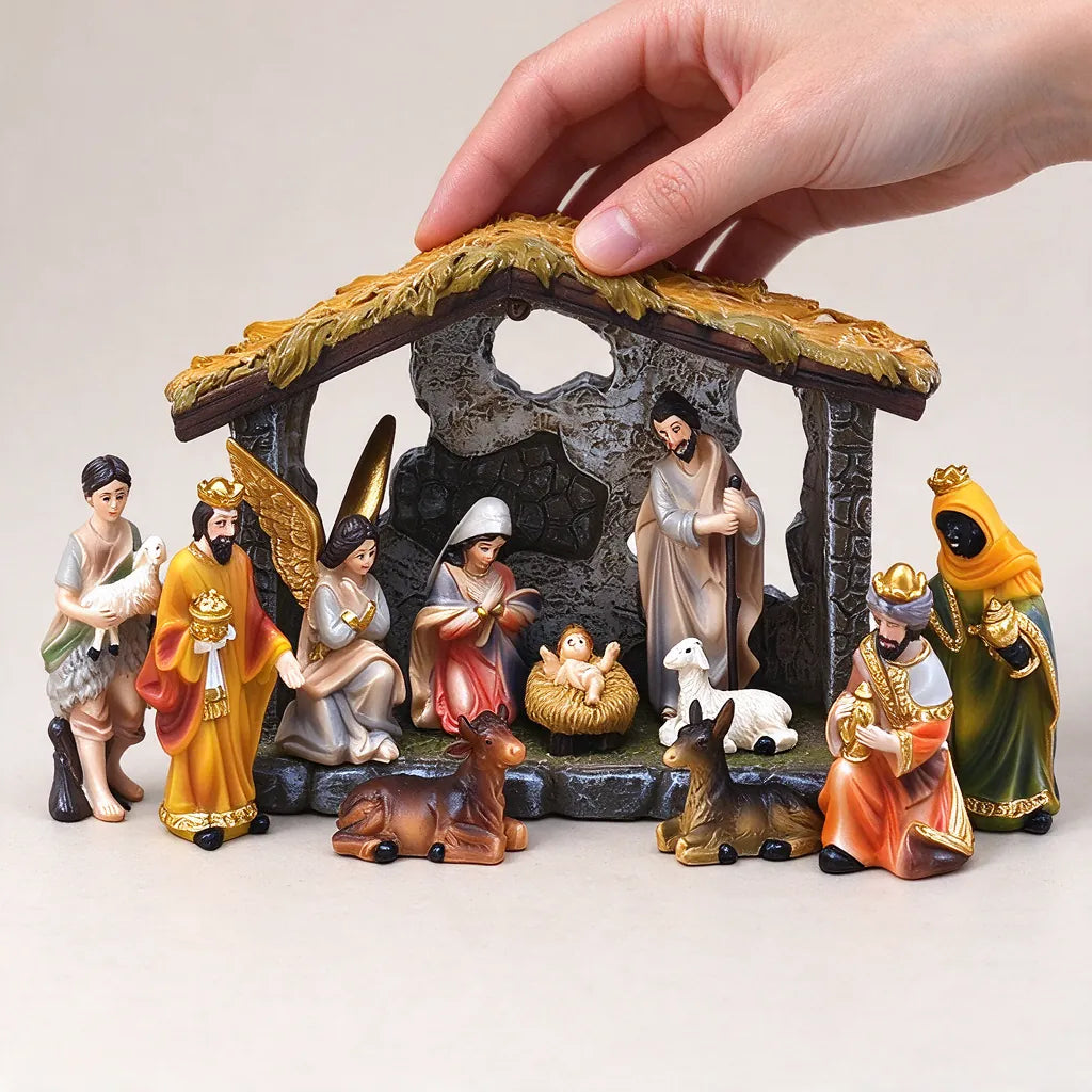 Hand adjusting the roof of a hand-painted nativity set with eleven figures
