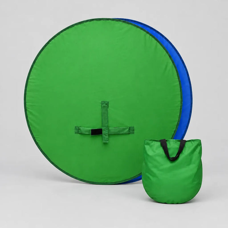 Round green screen backdrop with its green carry bag