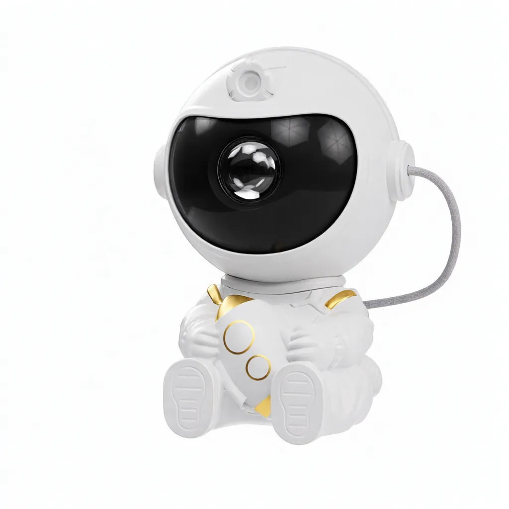 White astronaut galaxy projector night light with gold details on a white background