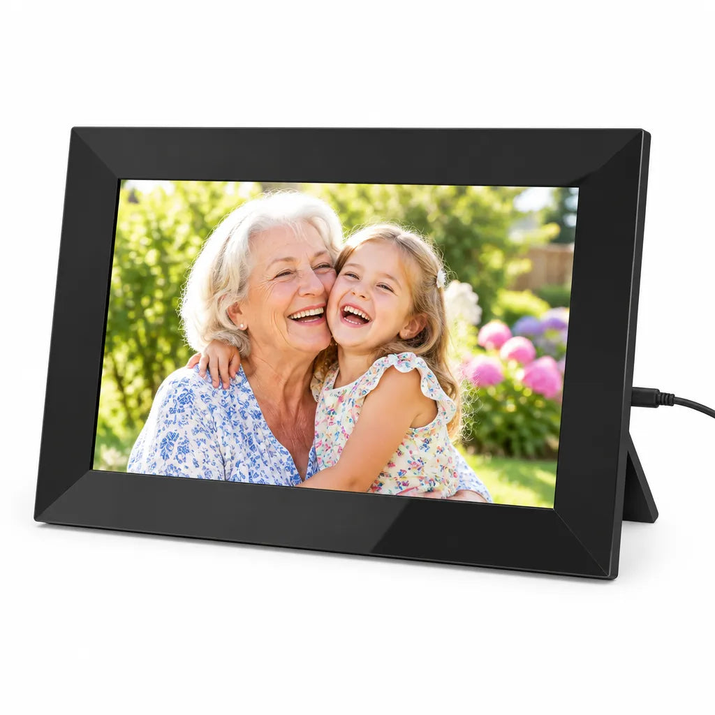 Black 10.1 inch digital picture frame with touch screen on its stand, showing a grandmother and granddaughter