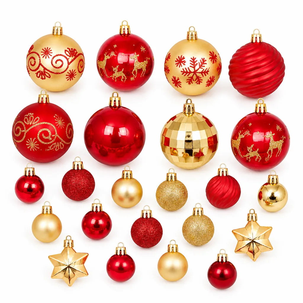 Set of red and gold Christmas baubles in two sizes with gold caps on white
