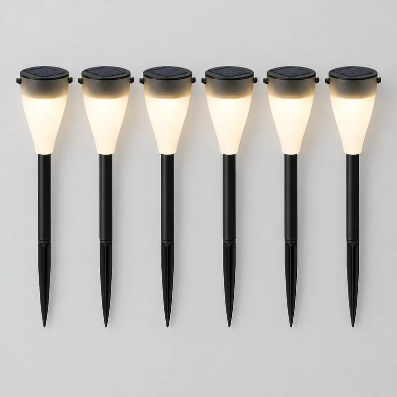 Luces solares con estaca colocadas una junto a otra
