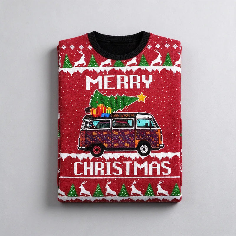 One folded Christmas jumper on a light grey surface