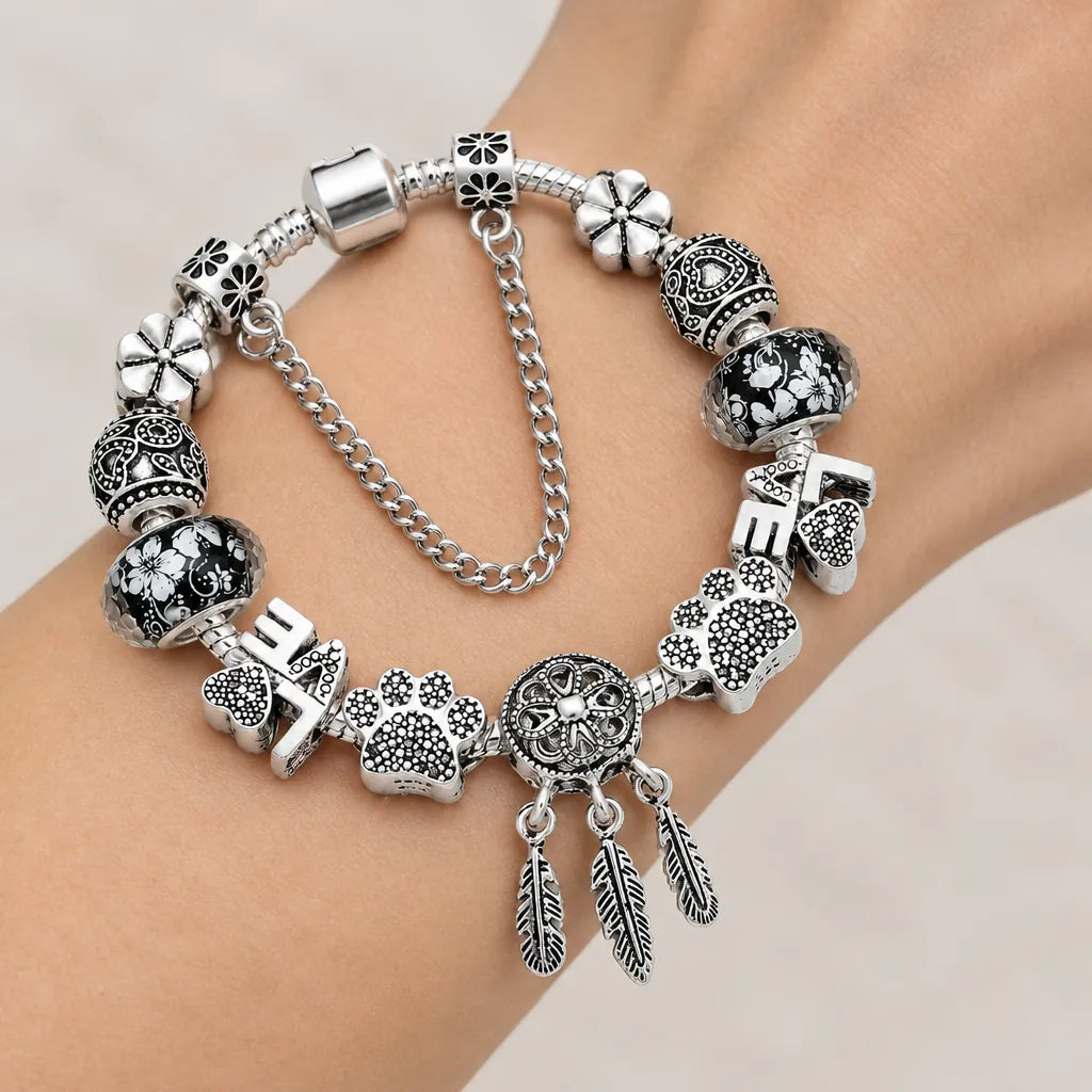 Silver Charm Bracelet with Dream Catcher & Paw Print Charms