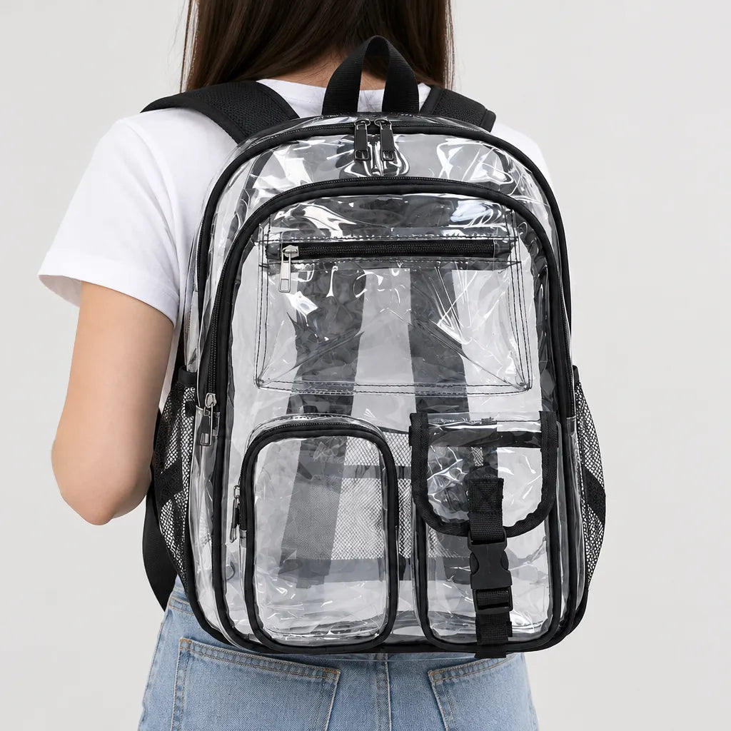 Person wearing a black-trim clear backpack with front pockets, seen from behind