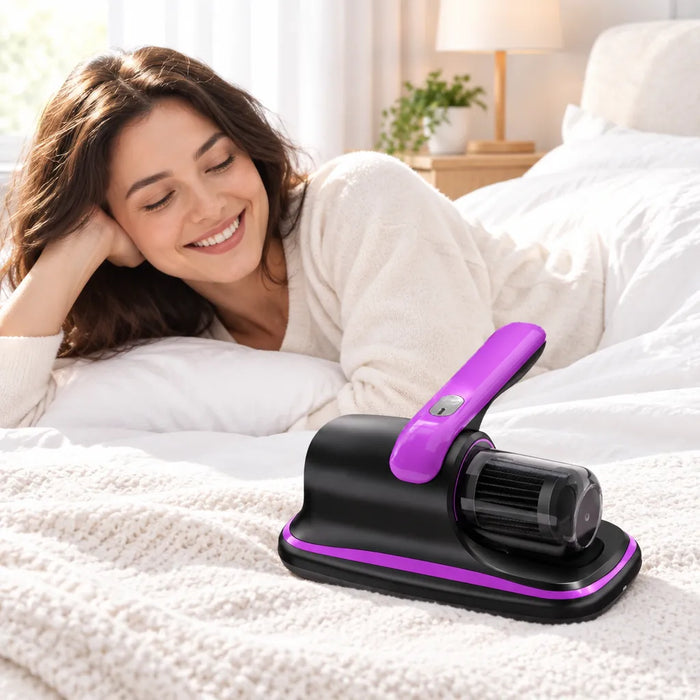 Smiling woman relaxing on a freshly cleaned bed beside a cordless bed vacuum