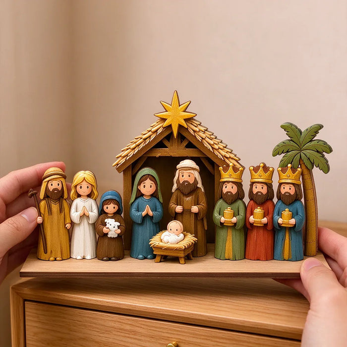 Hände stellen die Holz-Weihnachtskrippe auf einem Sideboard auf