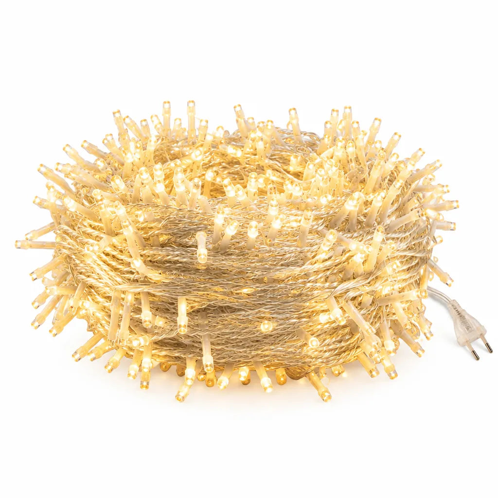 Coiled warm white LED string lights on a white background, plug-in outdoor string lights