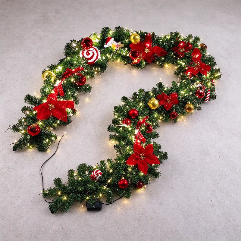 One pre-lit Christmas garland laid out with its battery pack