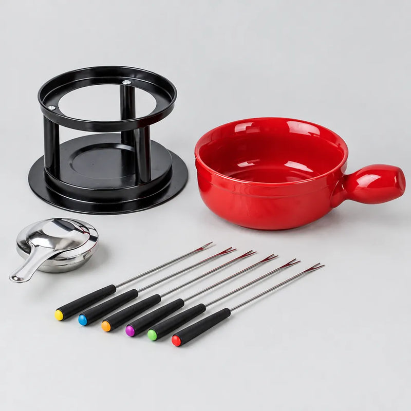 Fondue-Set: rotes Keramik-Caquelon, schwarzes Gestell, Stahlbrenner und sechs Gabeln