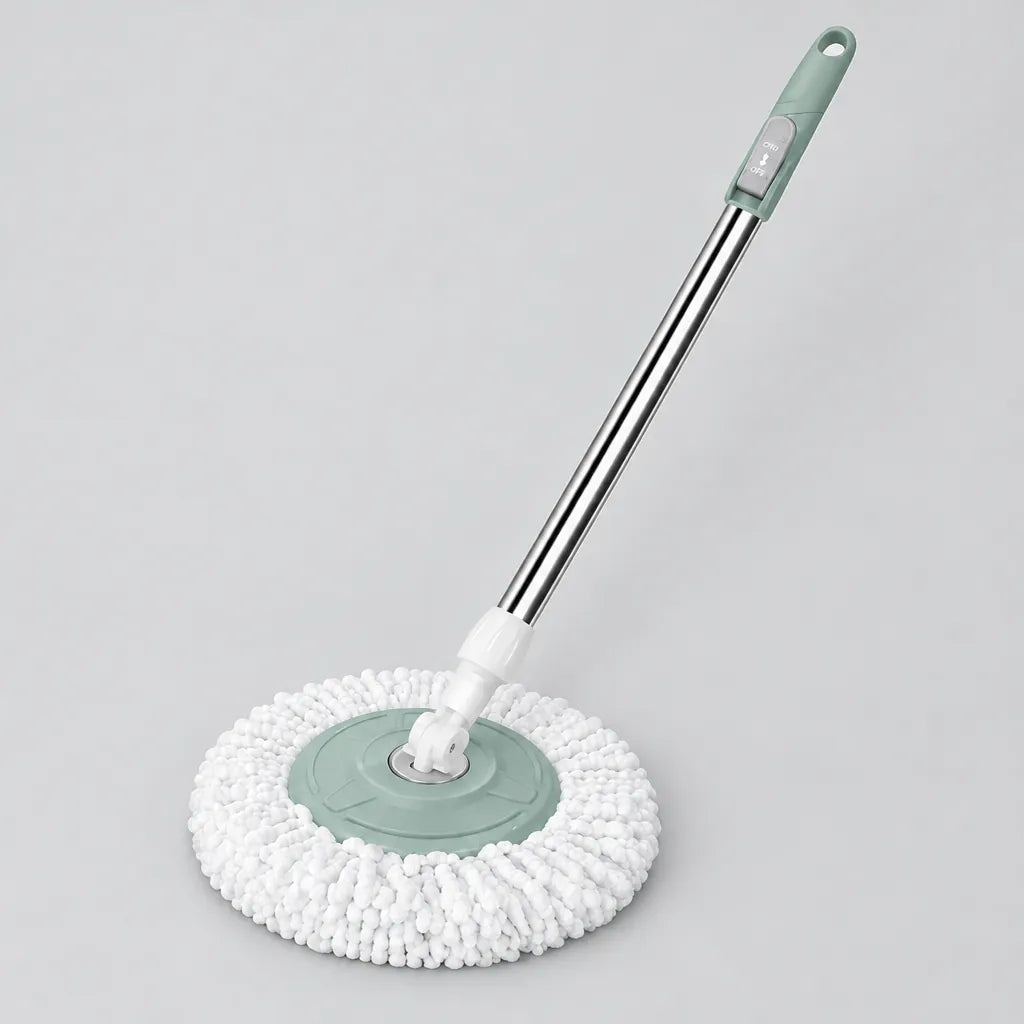 Spin mop with telescopic pole and round mop head laid on a grey surface