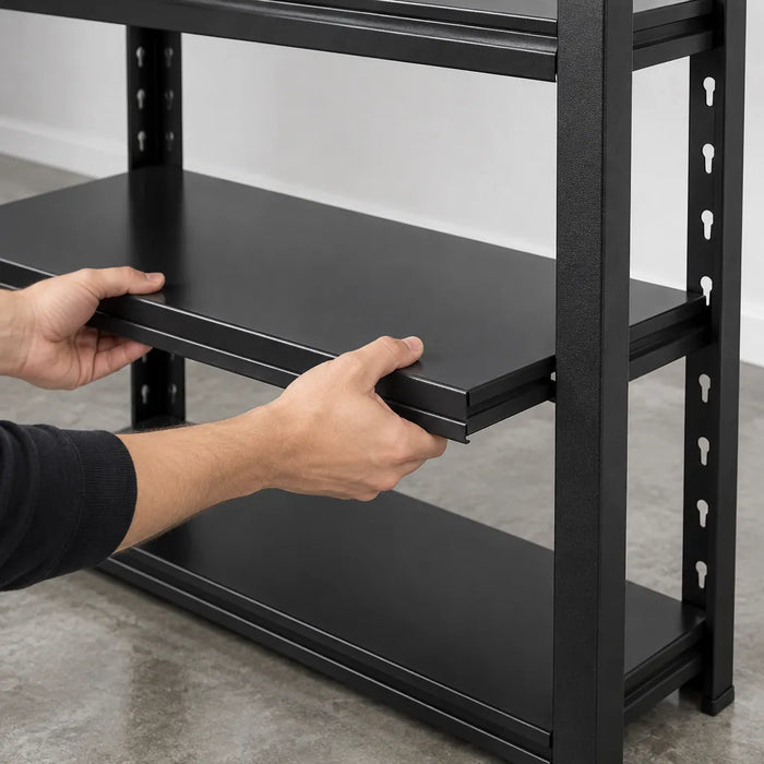 Hands sliding a steel shelf into the keyhole slots of a metal storage shelf post