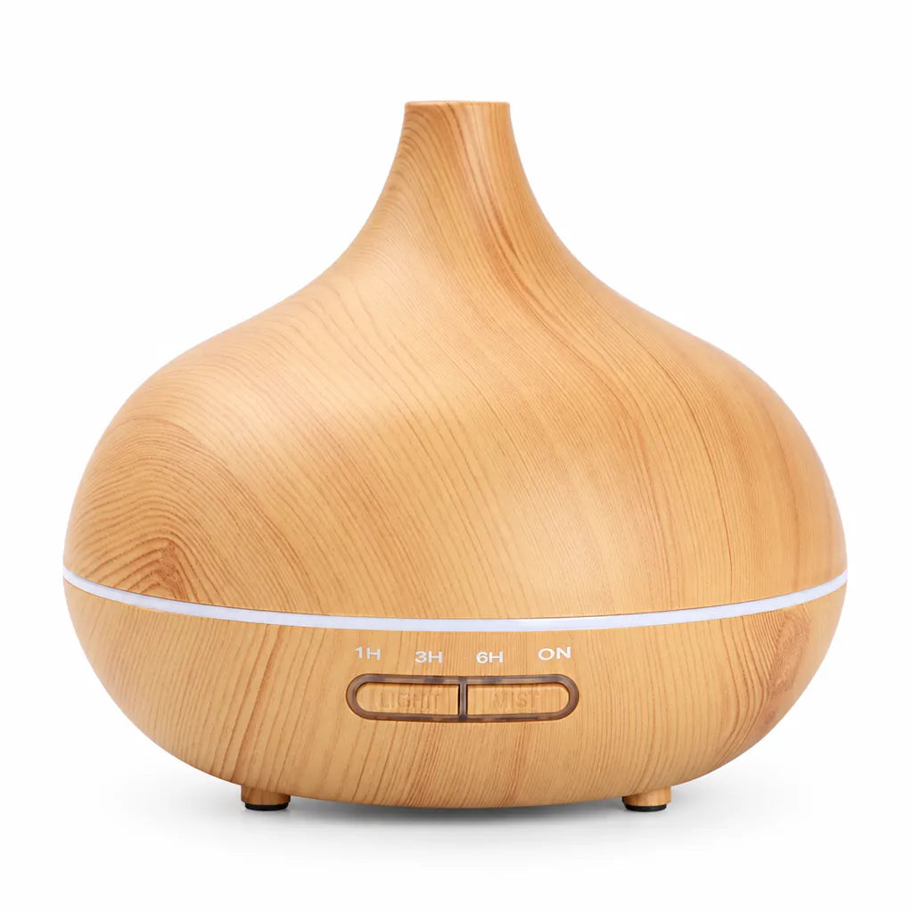 Light wood grain ultrasonic essential oil diffuser on a white background