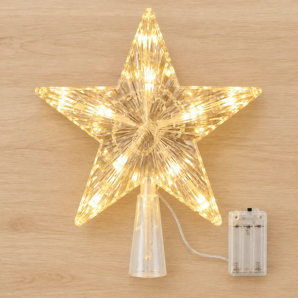 Star tree topper with cone base and battery box on a light wooden surface
