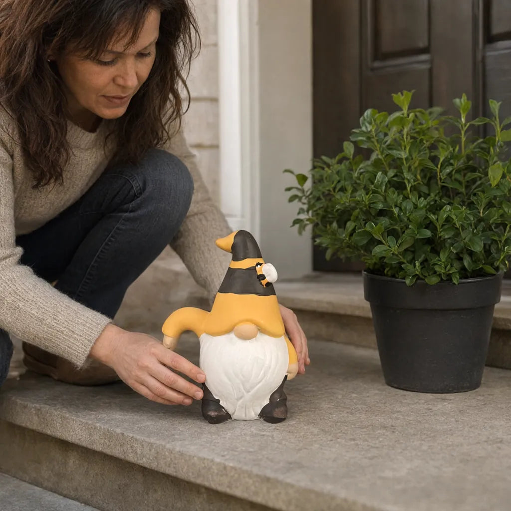 Woman setting a ceramic garden gnome statue on a porch step next to a potted plant